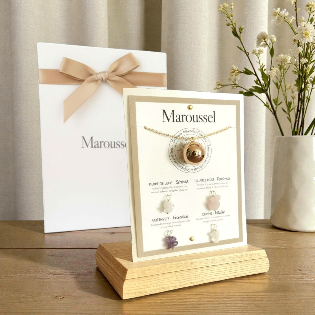 Bola de grossesse or avec 4 pendentifs en pierres naturelles